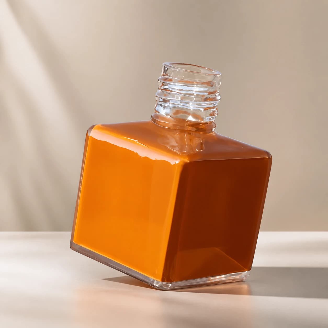 Three-quarter view of the finished oversized perfume bottle replica