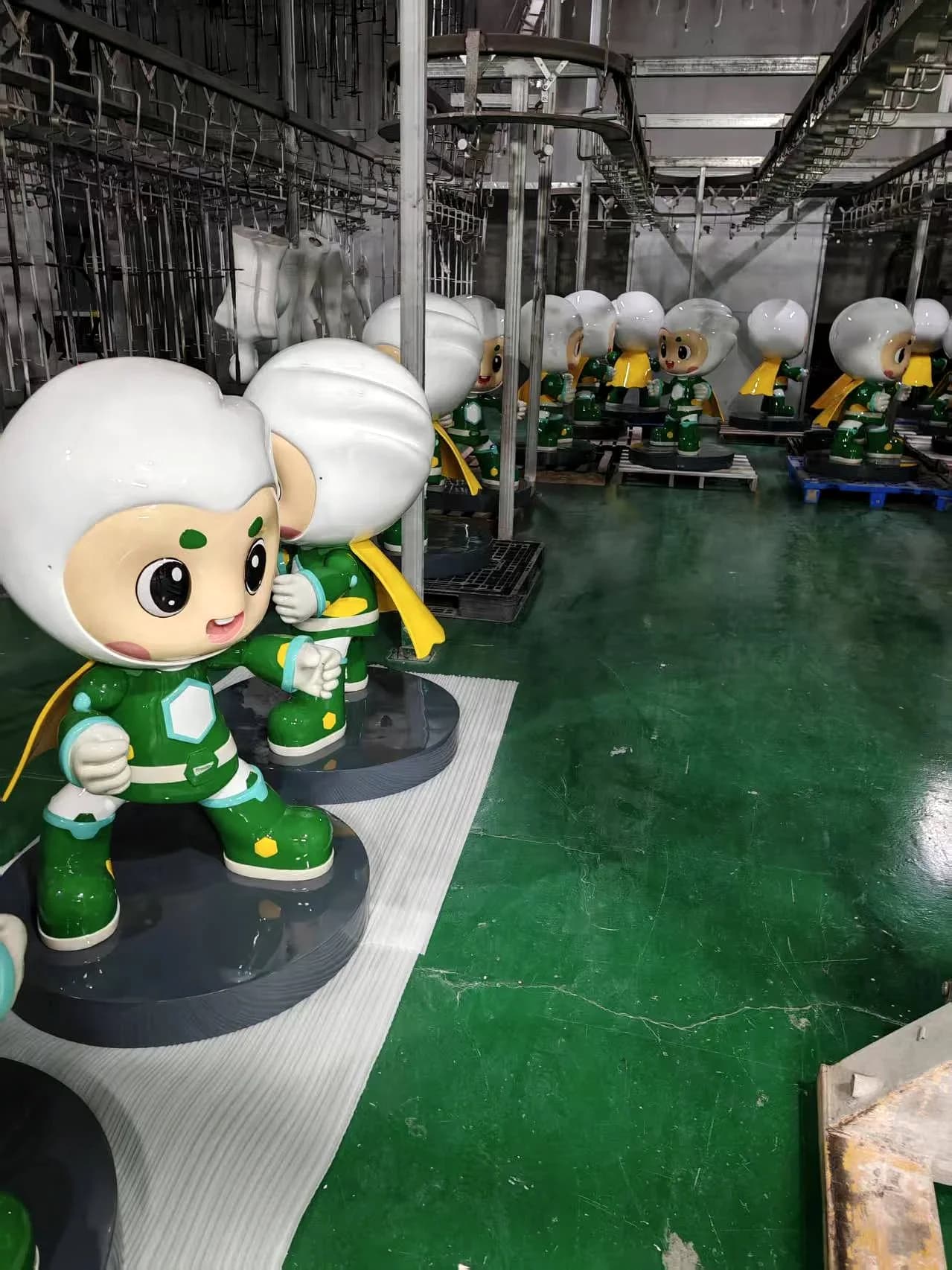Multiple Treezo mascot sculptures in batch production