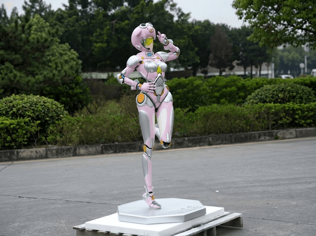 Detailed character sculpture with pink and metallic finishes, full front three-quarter view