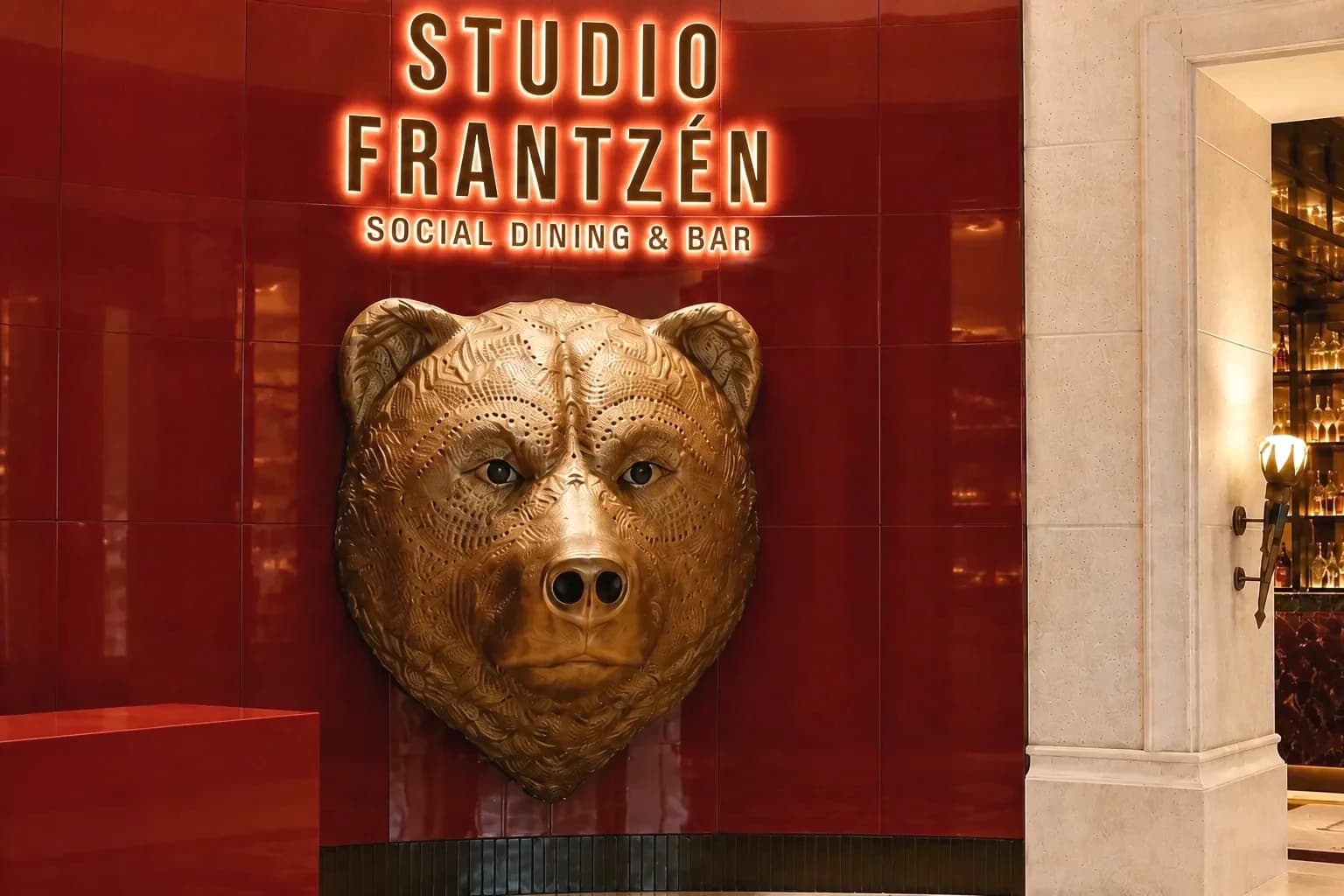Large bear sculpture installed at Studio Frantzén in Dubai within a premium hospitality interior.